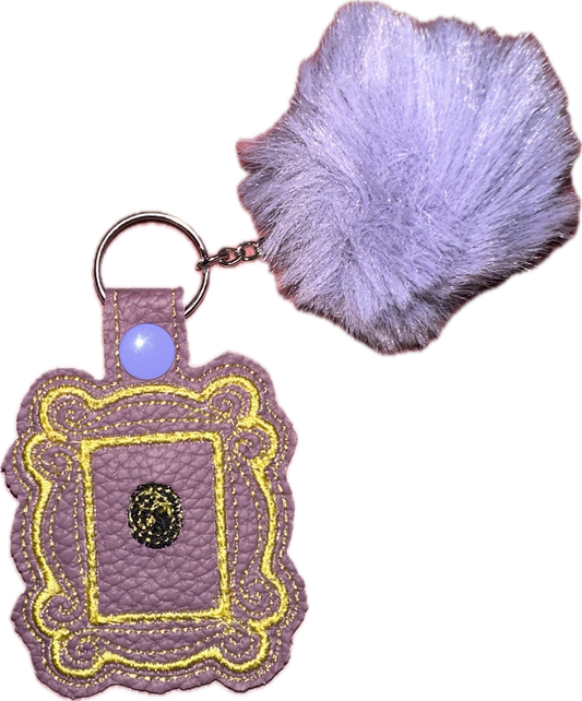 Peephole frame keychain with pompom